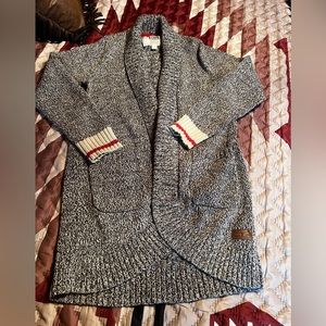 Cozy up in this warm Roots sweater